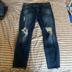 Dark blue ripped skinny jeans